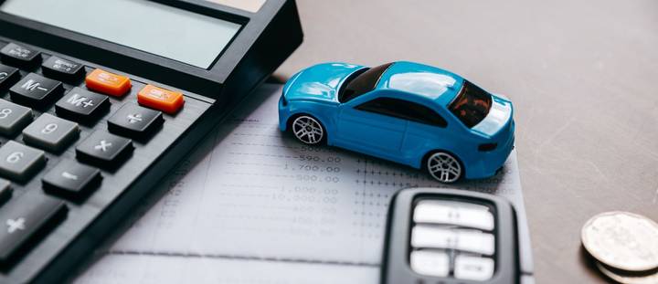 A toy car and calculator.