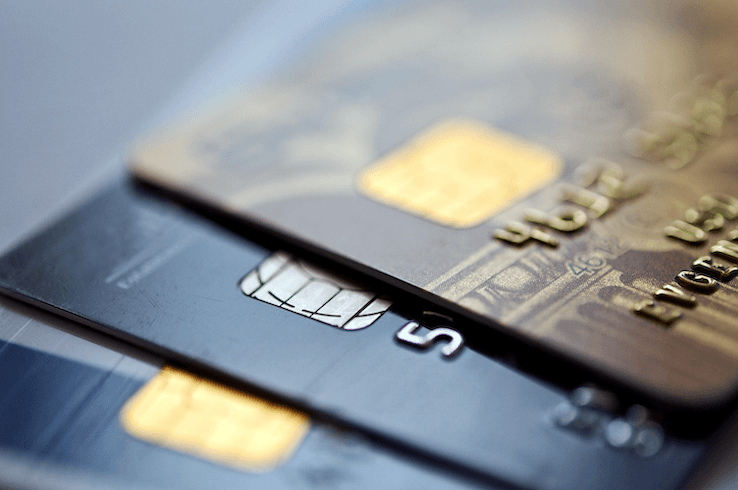 A close-up of premium New Zealand credit cards, illustrating the travel insurance benefits Kiwi cardholders can manage and compare using Quashed in 2026.