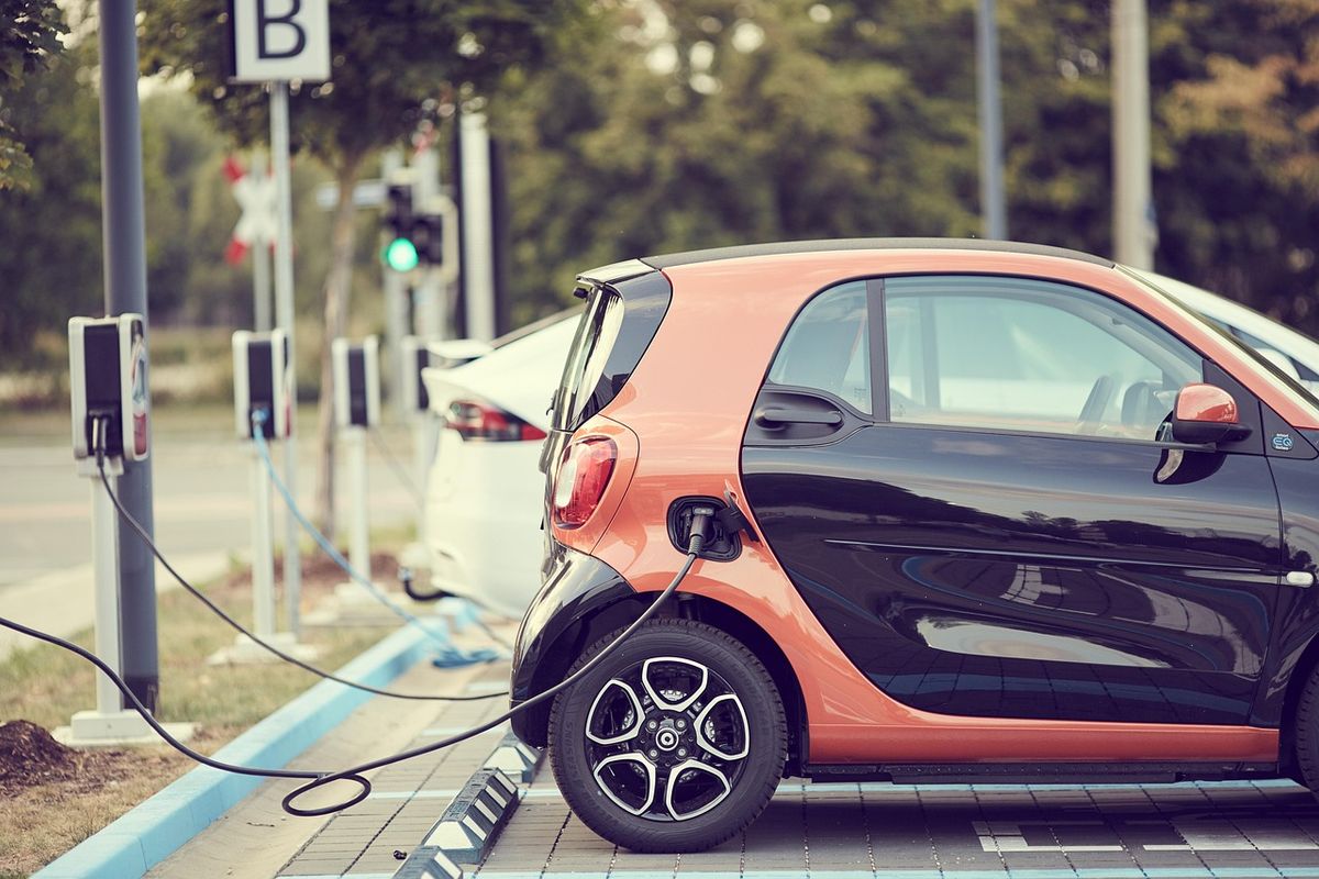 An electric vehicle being charged.