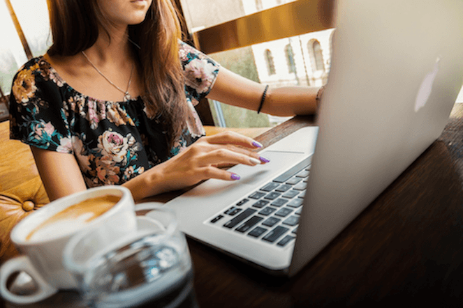 A person using a laptop.